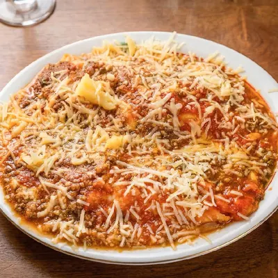 Talharim à bolonhesa com parmesão